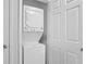 Cozy laundry closet with stacked washer and dryer at 2012 Long Bend Drive, Seabrook Island, SC 29455