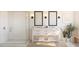 Modern bathroom with double sink vanity, glass enclosed shower, and neutral color palette at 2026 Mcguire Ln # 007, Hollywood, SC 29449