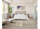 Bright primary bedroom with a comfortable bed, lots of natural light, and a neutral color palette at 2026 Mcguire Ln # 007, Hollywood, SC 29449