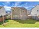 Exterior view of the home with fenced-in backyard and lush green grass at 212 Medford Dr, Summerville, SC 29485