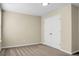 Bedroom featuring neutral walls, carpet floors, and a closet with doors at 212 Medford Dr, Summerville, SC 29485