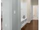 Hallway boasts storage, hardwood floors, and access to bathroom at 212 Medford Dr, Summerville, SC 29485
