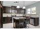 Stylish kitchen with granite countertops, stainless steel appliances, and a center island with seating at 212 Medford Dr, Summerville, SC 29485