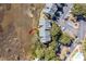 Marsh front condo featuring a community parking lot, trees, and landscaping at 2135 Landfall Way, Seabrook Island, SC 29455