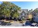 Charming two-story condo featuring mature trees and convenient parking at 2135 Landfall Way, Seabrook Island, SC 29455