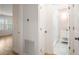 Hallway view leading to a bright bathroom and additional living space at 2135 Landfall Way, Seabrook Island, SC 29455