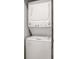 Laundry closet containing stacked washer and dryer at 2135 Landfall Way, Seabrook Island, SC 29455
