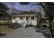 Charming home with a gravel driveway and freshly painted exterior at 2218 Dover St, North Charleston, SC 29405