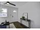 Bright living room with console table and view of the front door at 2218 Dover St, North Charleston, SC 29405