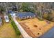 Aerial view of the property showing the house, driveway, and surrounding landscape at 2410 Trent St, Charleston, SC 29414