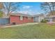 Well-maintained backyard features lawn and garden areas with landscaping at 2410 Trent St, Charleston, SC 29414