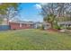 Spacious backyard with well maintained landscaping and a large lawn at 2410 Trent St, Charleston, SC 29414