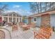 Inviting backyard patio with multiple seating areas perfect for entertaining guests at 2410 Trent St, Charleston, SC 29414