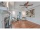 Bright living room with hardwood floors, fireplace, tray ceiling, and neutral decor at 2410 Trent St, Charleston, SC 29414