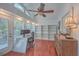 Bright office space with built-in shelves, vaulted ceiling, and access to outdoors at 2410 Trent St, Charleston, SC 29414