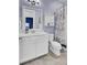 Charming bathroom features white vanity, nautical shower curtain, tub, and tiled floors at 2425 Giles Ln, Mount Pleasant, SC 29466