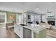 Island connects open concept living space with stainless steel dishwasher and convenient sink location at 2425 Giles Ln, Mount Pleasant, SC 29466