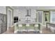 Modern kitchen featuring stainless steel appliances, a spacious island with seating, and a contemporary design at 2425 Giles Ln, Mount Pleasant, SC 29466