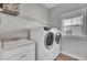 Efficient laundry room with modern appliances and ample storage, making laundry chores a breeze at 2425 Giles Ln, Mount Pleasant, SC 29466
