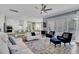 Open-concept living room, kitchen, and dining area with sleek finishes and modern design at 2425 Giles Ln, Mount Pleasant, SC 29466