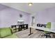 Home office featuring modern desk, ergonomic chair, and ample natural light at 2425 Giles Ln, Mount Pleasant, SC 29466