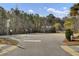 Convenient parking area surrounded by trees, providing ample space for vehicles in a tranquil setting at 2425 Giles Ln, Mount Pleasant, SC 29466