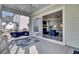 Inviting covered patio with comfortable seating, perfect for outdoor relaxation and entertaining guests at 2425 Giles Ln, Mount Pleasant, SC 29466