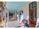Cozy front porch with comfortable seating, providing a relaxing outdoor space at 2514 Myrtle Ave, Sullivans Island, SC 29482
