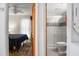 The bathroom is adjacent to the bedroom and features a modern, tiled walk-in shower at 278 Driftwood Ln, Edisto Island, SC 29438