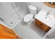 Well-lit bathroom features a glass shower, tiled floors, a toilet, and a sleek vanity sink at 278 Driftwood Ln, Edisto Island, SC 29438