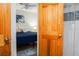Bright bedroom with a comfortable bed and an art piece hanging on the wall at 278 Driftwood Ln, Edisto Island, SC 29438