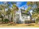 White Condo buildings with multiple balconies and green landscaping at 278 Driftwood Ln, Edisto Island, SC 29438