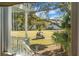 Scenic view of the golf course and surrounding buildings from the condo at 278 Driftwood Ln, Edisto Island, SC 29438