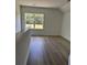 Upstairs bonus room with great natural light, hard wood floors and views of the outdoors at 2988 Lodge Berry Ln, Johns Island, SC 29455