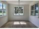 Bright dining room with hardwood floors, white trim, and chandelier at 2988 Lodge Berry Ln, Johns Island, SC 29455