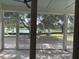 View of the pond from the screened in patio at 2988 Lodge Berry Ln, Johns Island, SC 29455