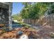 Landscaped backyard featuring a privacy fence, hardscape walkway, and lawn at 3092 Emma Ln, Mount Pleasant, SC 29466