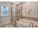 Bathroom with a tiled shower and soaking tub at 3092 Emma Ln, Mount Pleasant, SC 29466