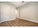 This bedroom features hardwood floors, white trim and doors, and an electrical outlet at 3092 Emma Ln, Mount Pleasant, SC 29466