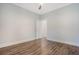 Empty bedroom with hardwood floors, neutral walls, and bright lighting at 3092 Emma Ln, Mount Pleasant, SC 29466