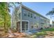 View of the back of the house and backyard from the side of the property at 3092 Emma Ln, Mount Pleasant, SC 29466