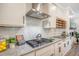 Bright kitchen featuring white cabinets, subway tile backsplash, and stainless steel appliances at 3092 Emma Ln, Mount Pleasant, SC 29466