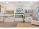 Bright open-concept living space with fireplace and built-in bar area at 3092 Emma Ln, Mount Pleasant, SC 29466