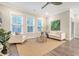 Inviting living room with ample natural light, neutral decor, and comfortable seating at 3092 Emma Ln, Mount Pleasant, SC 29466