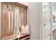 Cozy mudroom area with a built-in bench, hooks, and storage, adjacent to a door at 3092 Emma Ln, Mount Pleasant, SC 29466