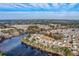 Aerial perspective of community with pond, showcasing neighborhood layout and scenic environment at 339 Cicadas Song, Moncks Corner, SC 29461