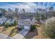 A stunning aerial view of the home in a neighborhood with a pond at 339 Cicadas Song, Moncks Corner, SC 29461