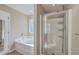 Bright bathroom featuring a shower and a soaking tub at 339 Cicadas Song, Moncks Corner, SC 29461