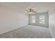 Bedroom with a ceiling fan and two windows at 339 Cicadas Song, Moncks Corner, SC 29461