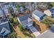 Inviting home with well-kept lawn, driveway, and a glimpse of the surrounding neighborhood and waterfront at 339 Cicadas Song, Moncks Corner, SC 29461